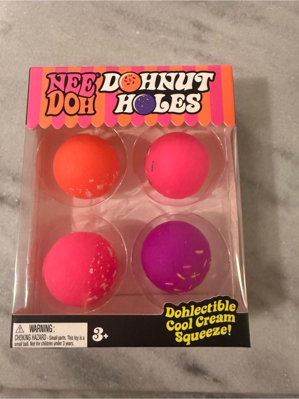 NeeDoh Donut Holes Kids Squeeze Toy Set - Pink, Orange, Purple
